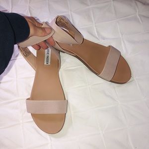 Never been worn stretchy tan Steve Madden sandals.